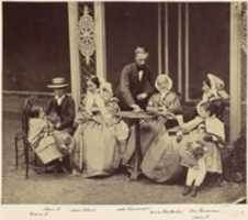 Free download [Group Portrait of Five Adults and Two Children in a Garden] free photo or picture to be edited with GIMP online image editor